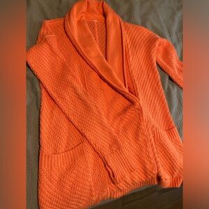Lululemon size 6 cocoon bright orange sweater with pockets. Excellent condition!